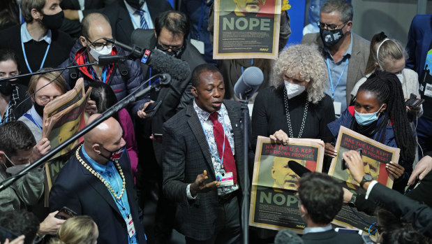 Emmanuel Tachie-Obeng from Ghana speaks to reporters ahead of the Glasgow climate summit’s final day.