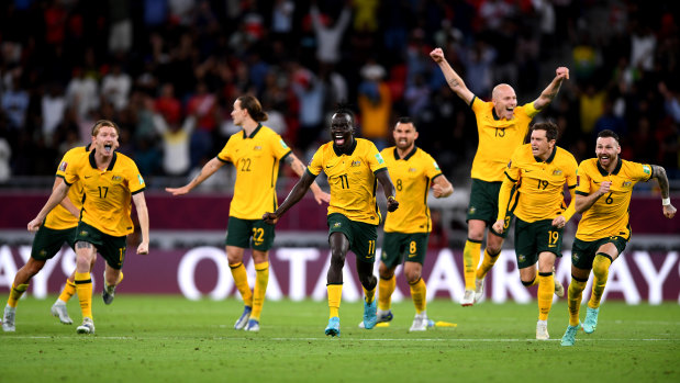 An elated Aaron Mooy jumps for joy after Australia beat Peru to reach the World Cup finals.