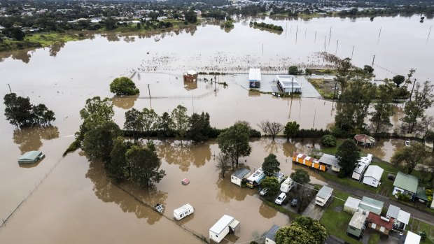 Low-lying parts of Singleton are inundated by floodwaters along the Hunter River. 