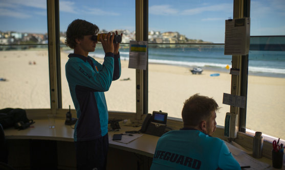 Lifeguards keep watch at Bondi Beach ahead of warmer weather this weekend. 
