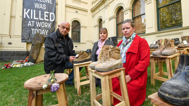 Dave and Janine Brownlee and Lana Cormie, next to the boots of Dave and Janine's son Jack, and the boots of Lana's husband Charlie Howkins at a memorial in Melbourne earlier this year. 