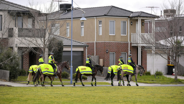 Mounted police patrol the area where over 100 teenagers gathered.