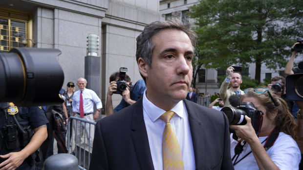 Michael Cohen, Trump's  former personal lawyer, leaves federal court after reaching a plea agreement in New York on Tuesday. 