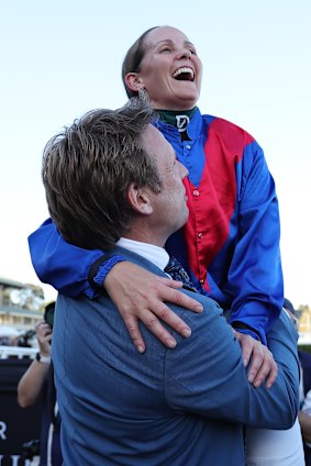 Bjorn Baker lifts jockey Rachel King after the Sydney Cup win.