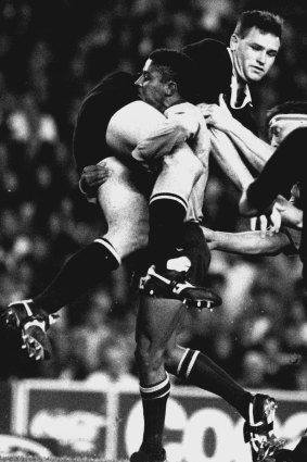 George Gregan picks up All Blacks second-rower, Mark Cooksley and dumps him during the second half of the Wallabies’Bledisloe Cup Test, August 16, 1994 at the Sydney Football Stadium.