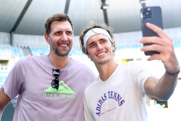 Dirk Nowitzki and Alexander Zverev pose after a hit last week.