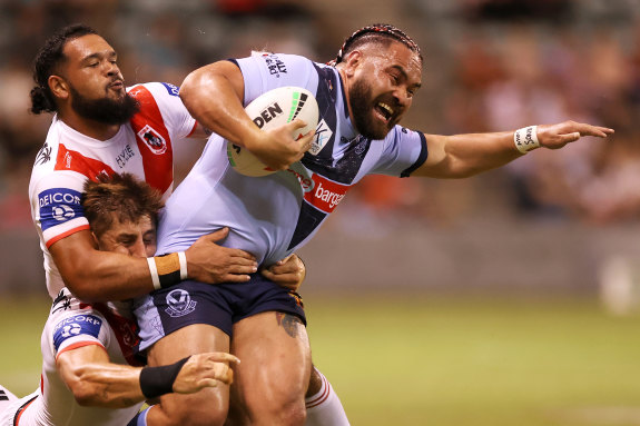 Konrad Hurrell makes a powerful charge for St Helens.