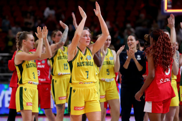 The Opals celebrate victory.