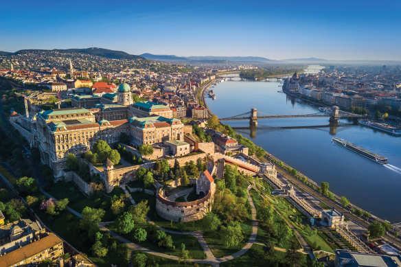 Budapest at sunrise with the Szechenyi Chain Bridge over the Danube.