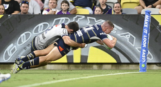 Tom Gilbert scores a stunning a solo try for the Cowboys.