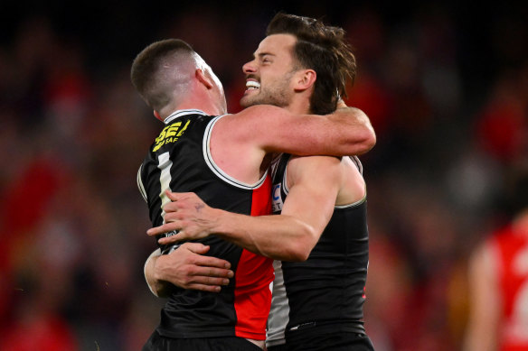 Jack Higgins and Jack Sinclair of the Saints celebrate a goal.