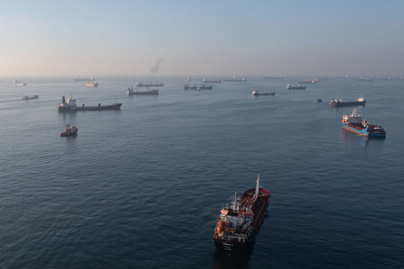 Ships, including those carrying grain from Ukraine and awaiting inspections, are seen anchored off the Istanbul coastline on Wednesday.