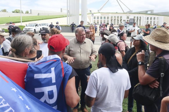 Craig Kelly speaks with people at the Convoy to Canberra protest in the front of Parliament House on February 5.
