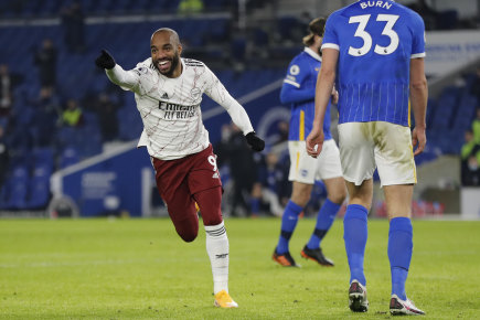 Alexandre Lacazette celebrates scoring against Brighton just 29 seconds after coming on for Arsenal.