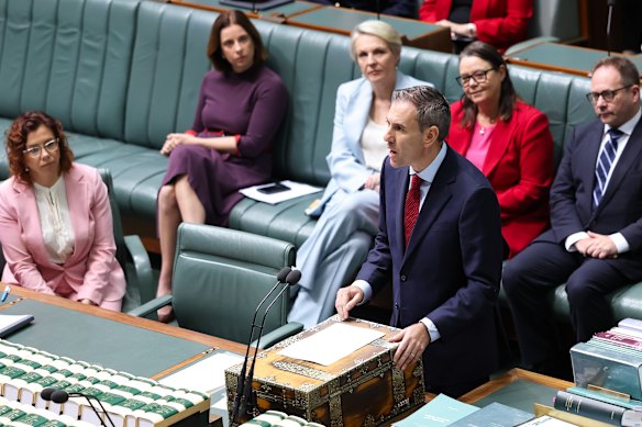 Treasurer Jim Chalmers reads the bill into the House of Representatives on Thursday morning.