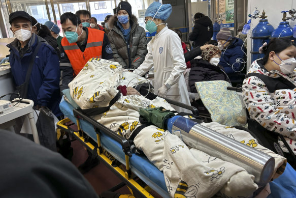 Chinese hospitals, like this one in Beijing, have been overwhelmed by the surge in COVID patients since President Xi Jinping quickly rolled back his zero-COVID policy.