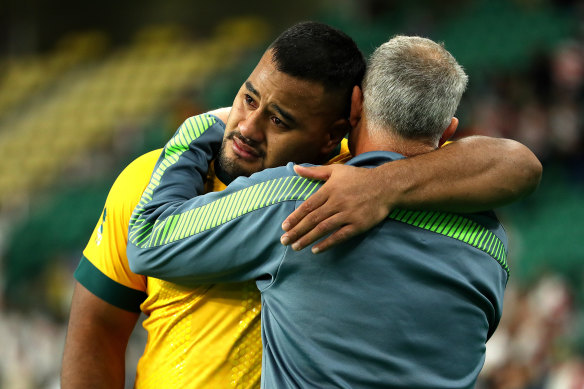 Taniela Tupou is consoled after Australia’s quarter-final defeat to England in the 2019 World Cup. 