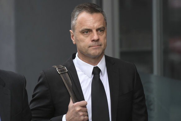 Commander Bateson outside court in 2019.