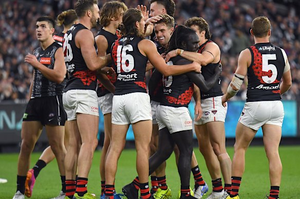 The Bombers celebrate a goal.