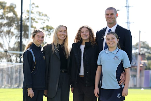 Matt King poses with daughters Charlie, Willow, Harper and wife Kirsten after his appointment on Tuesday.