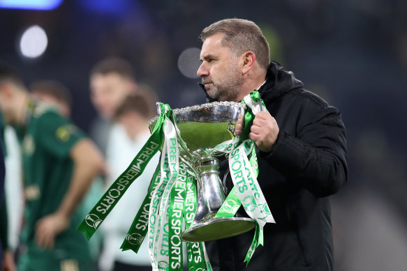 Ange Postecoglou with the Scottish League Cup trophy at Hampden Park.