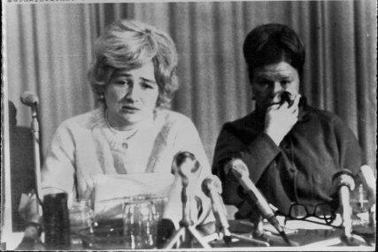 Lyudmila Petrovna Belenko (left) reads a statement at a Moscow news conference, asserting that her husband, Viktor, did not want to defect, 1976. Belenko rejected claims he left a wife and child behind.