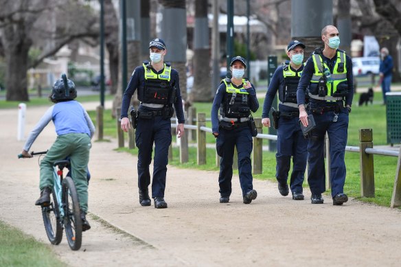 Police patrolling Princes Park last week as part of their lockdown enforcement.
