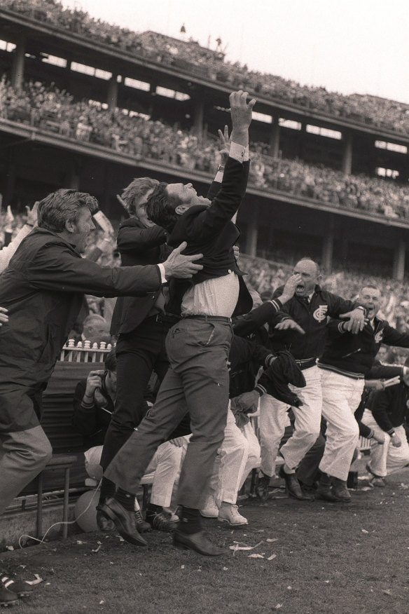 Carlton coach Ron Barassi jumps for joy after the comeback win.