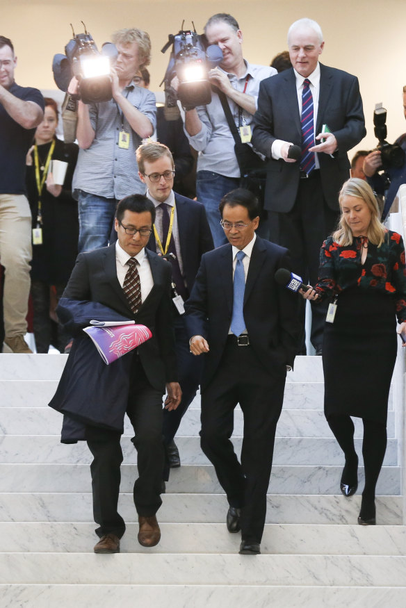 The Chinese ambassador to Australia, Cheng Jingye, is pursued by the media as he departs Parliament House after the Australia China Business Council networking day.