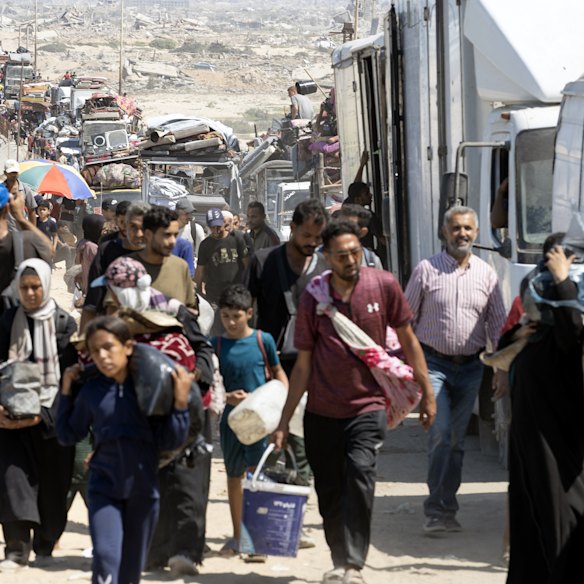 A huge column of Palestinians flee Gaza City as Israel’s military moved in.