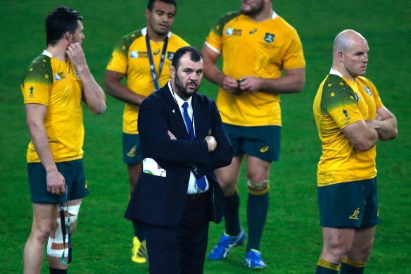 It's time: Australian coach Michael Cheika stands with captain Stephen Moore after they lost 34-17 to New Zealand in the Rugby World Cup final at Twickenham in 2015.