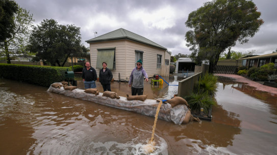 Brian and Glenys Mulcahy trying to protect their Rochester home. 