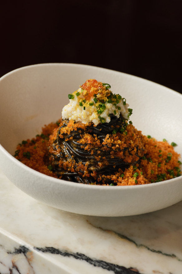 Squid ink spaghetti with ’nduja crumb.