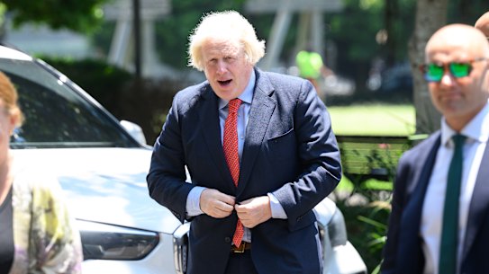 Former British prime minister Boris Johnson arrives to speak at the event in Sydney on Friday.