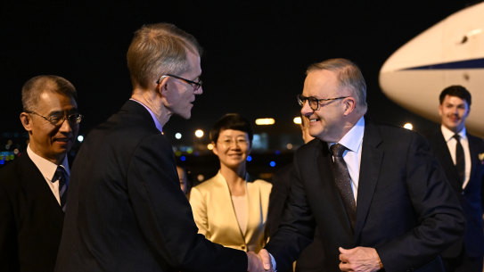 Australia’s Ambassador to China Graham Fletcher greets Australia’s Prime Minister Anthony Albanese after arriving at Hongqiao Airport, Shanghai in China, Saturday, November 4, 2023.