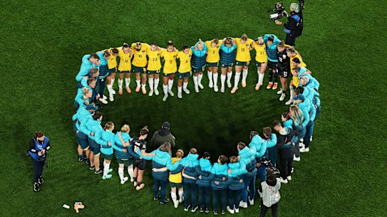 The Matildas squad huddle after the team’s defeat and elimination from the tournament.