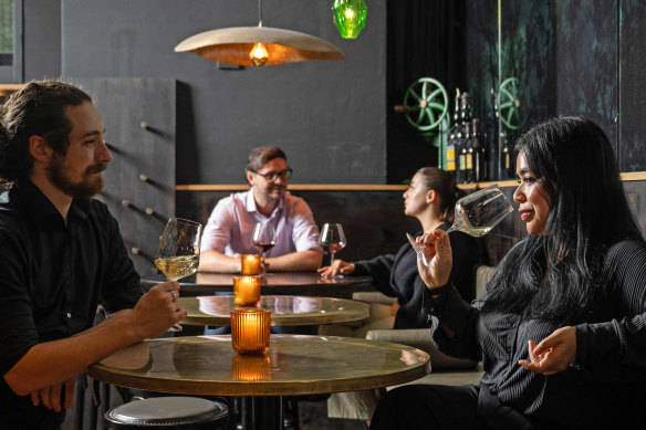 Diners sample the lineup of Coravin wines at Bentley Restaurant &amp; Bar.