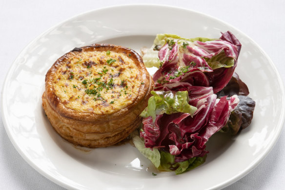 Leek tart with fresh lettuce in a tart vinaigrette.