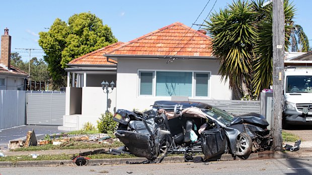 Debris is scattered over the road after a car crash. 