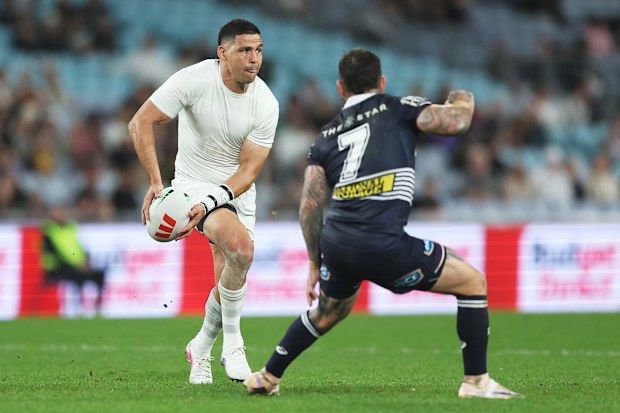 Cody Walker of the Rabbitohs looks to pass.