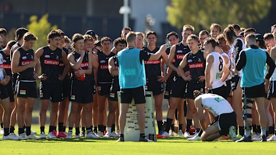 MELBOURNE, AUSTRALIA - APRIL 28: Magpies coach, Nathan Buckley speaks to the players during a Collingwood Magpies AFL training session at Holden Centre on April 28, 2021 in Melbourne, Australia. (Photo by Robert Cianflone/Getty Images)