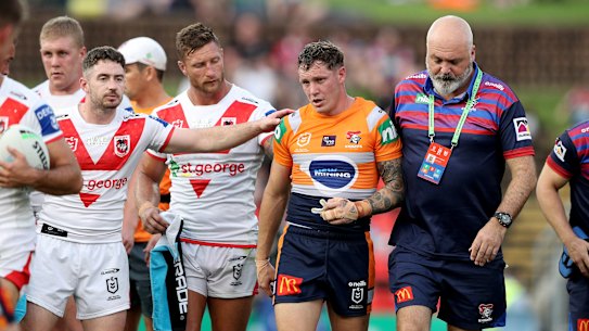 Newcastle’s Kurt Mann is helped off after a heavy hit on Sunday.