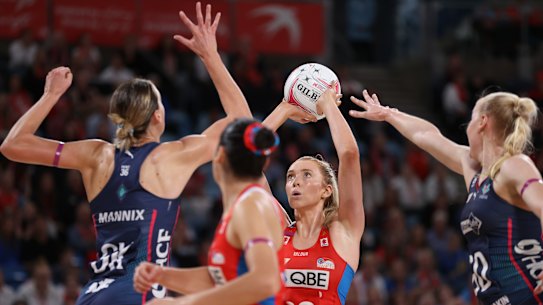 Helen Housby shoots for goal.