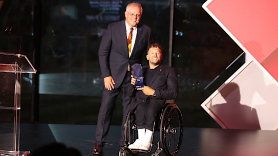 Australian of the year Dylan Alcott and Prime Minister Scott Morrison on  Tuesday night.