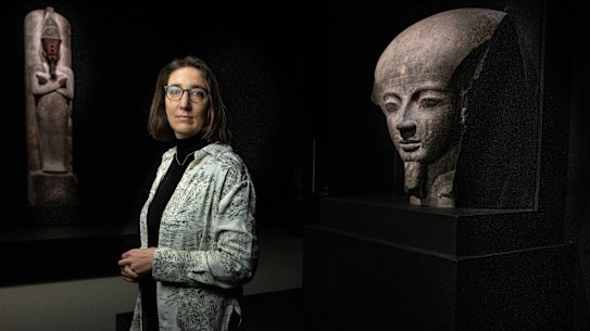 Marie Vandenbeusch, a curator from the British Museum with an exhibit.