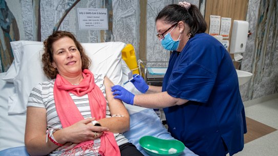 A volunteer takes part in trials of UQ's vaccine candidate in July. 