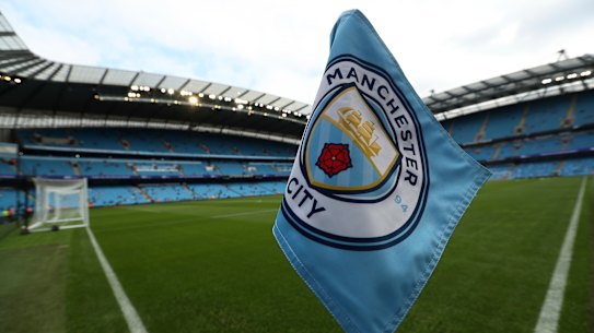 The Manchester City club logo on a corner flag before an English Premier League match.