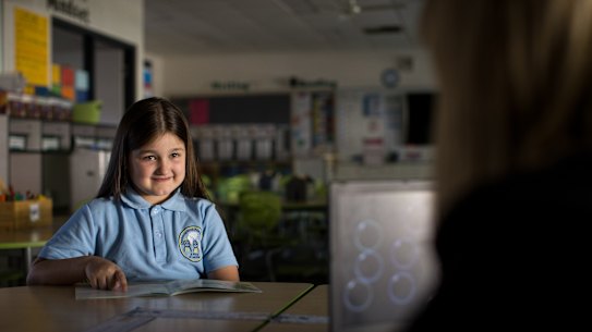Dandenong South Primary School student Mikayla Lumanovski doing a one-on-one phonics check as part of a new pilot program in 22 Victorian schools.