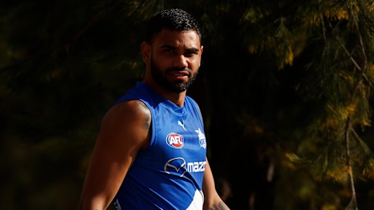 Tarryn Thomas is serving an 18-match AFL suspension and was sacked by North Melbourne.