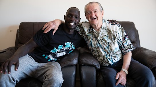 Mariners star Ruon Tongyik and his 82-year-old neighbour, Remo Pertot.